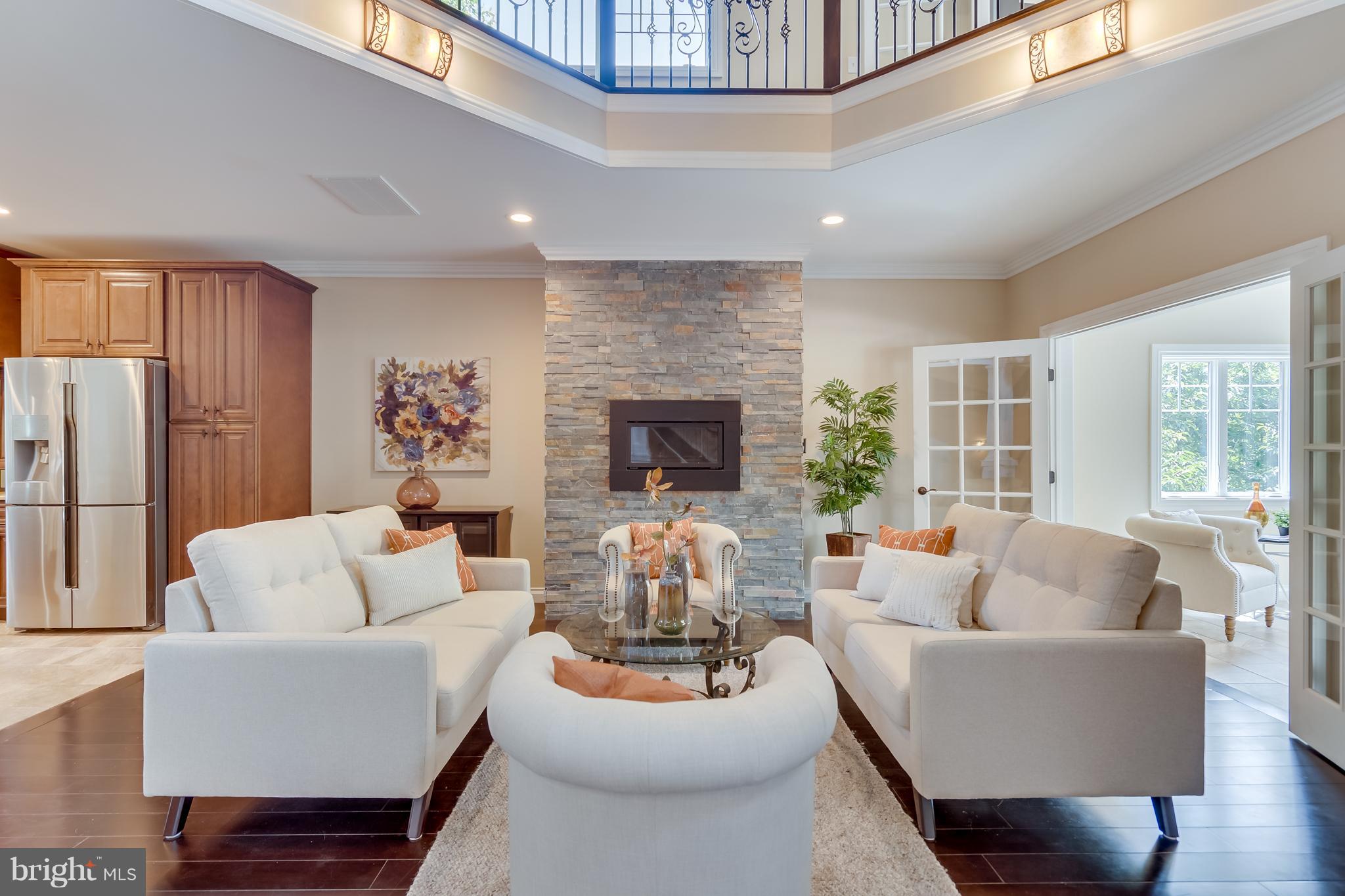 1415 Julia Avenue McLean, VA 22101 - Photo 3 of 30 a living room with furniture and a fireplace