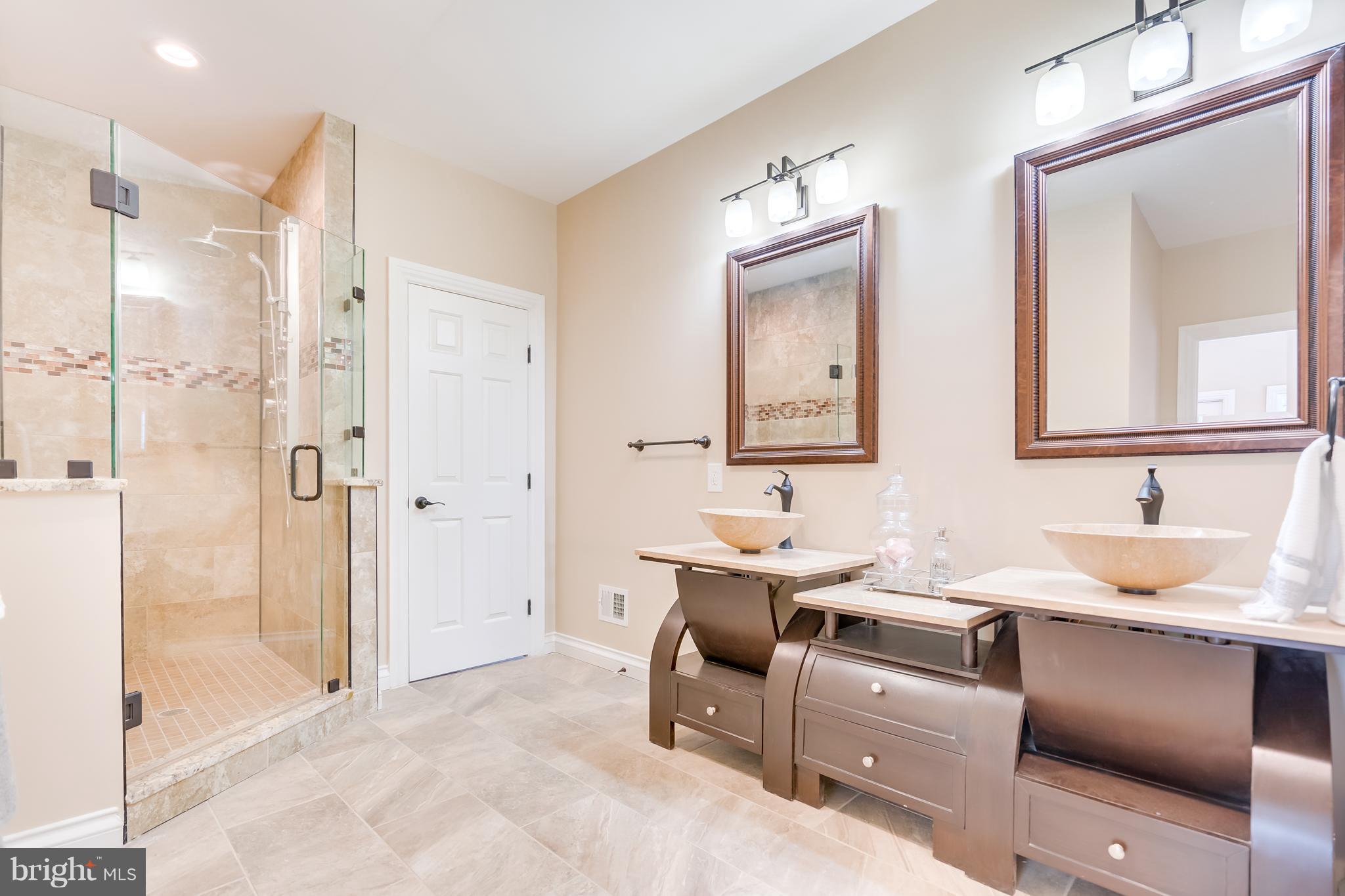 1415 Julia Avenue McLean, VA 22101 - Photo 28 of 30 a bathroom with a sink and a mirror