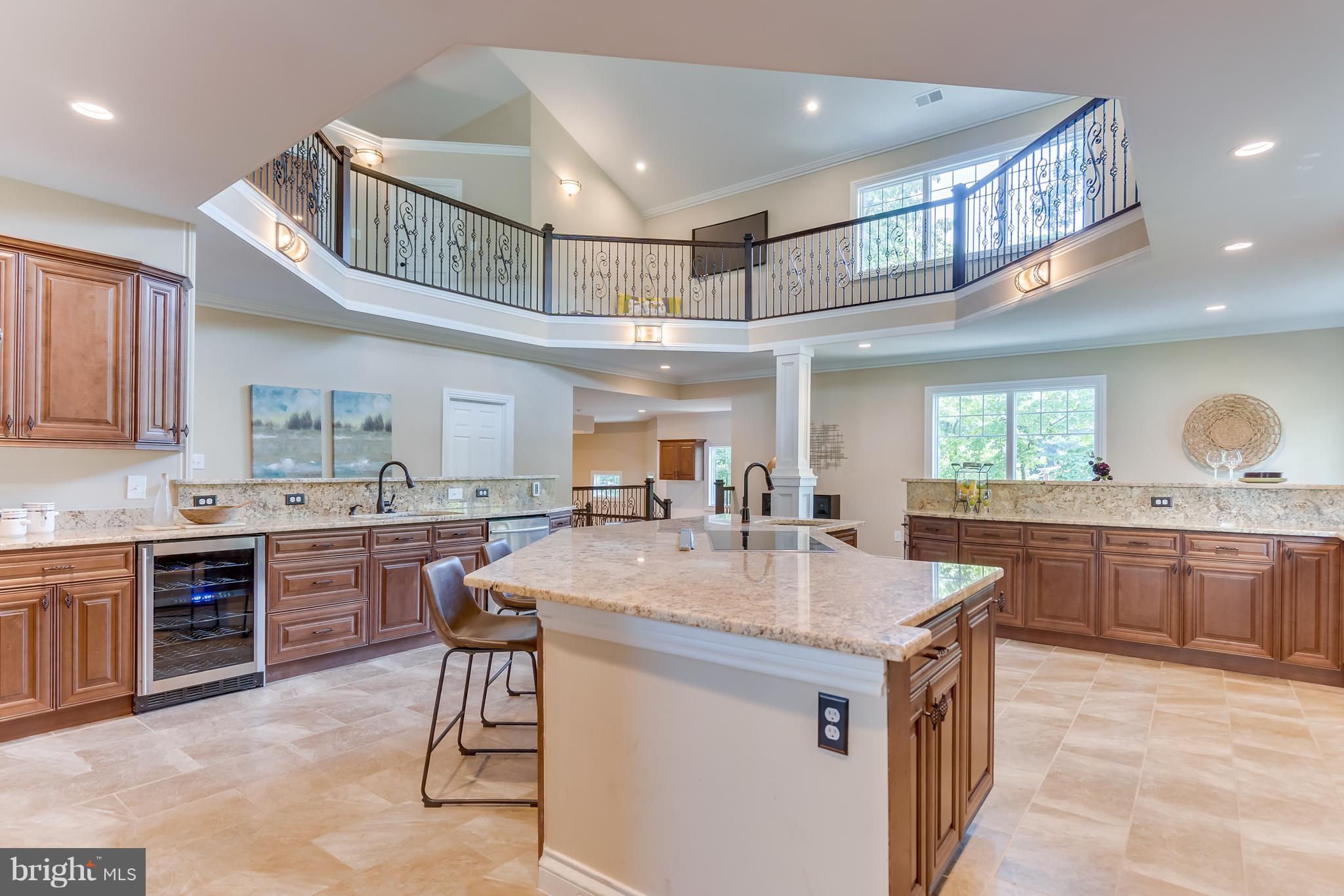 1415 Julia Avenue McLean, VA 22101 - Photo 6 of 30 a kitchen with stainless steel appliances granite countertop a sink and stove