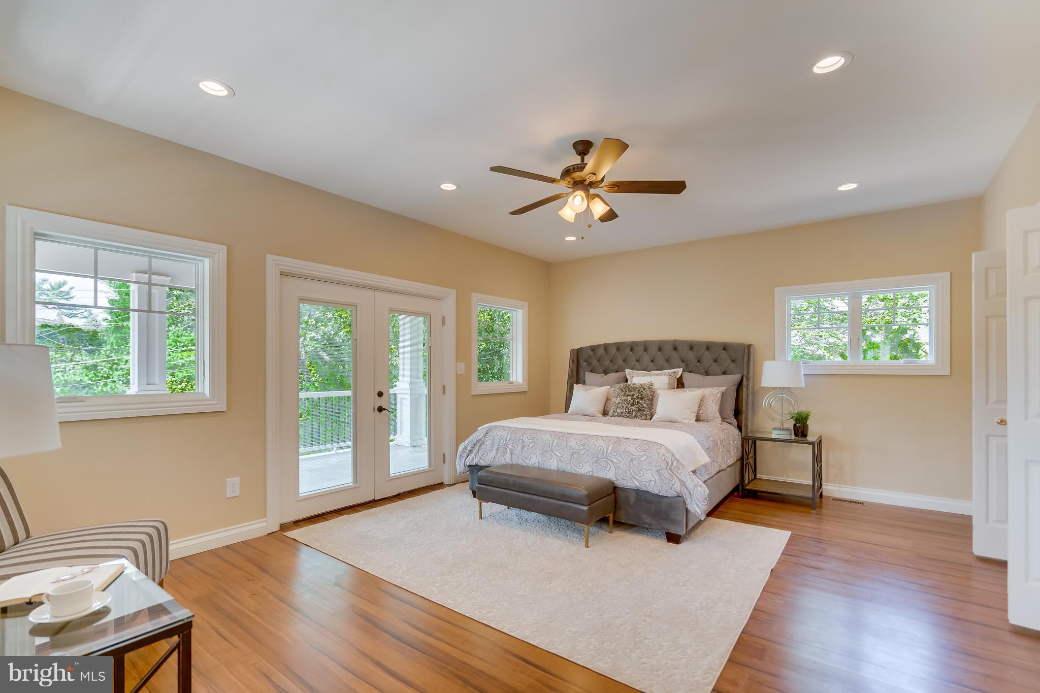 1415 Julia Avenue McLean, VA 22101 - Photo 9 of 30 a spacious bedroom with a large bed and a window