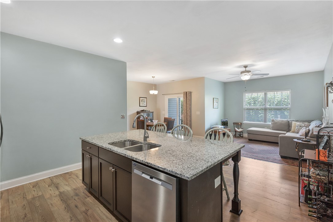 121 Ventura Street Anderson, SC 29621 - Photo 32 of 32 An open concept floorplan seamlessly connects the kitchen with a comfortable living area, ideal for daily living.