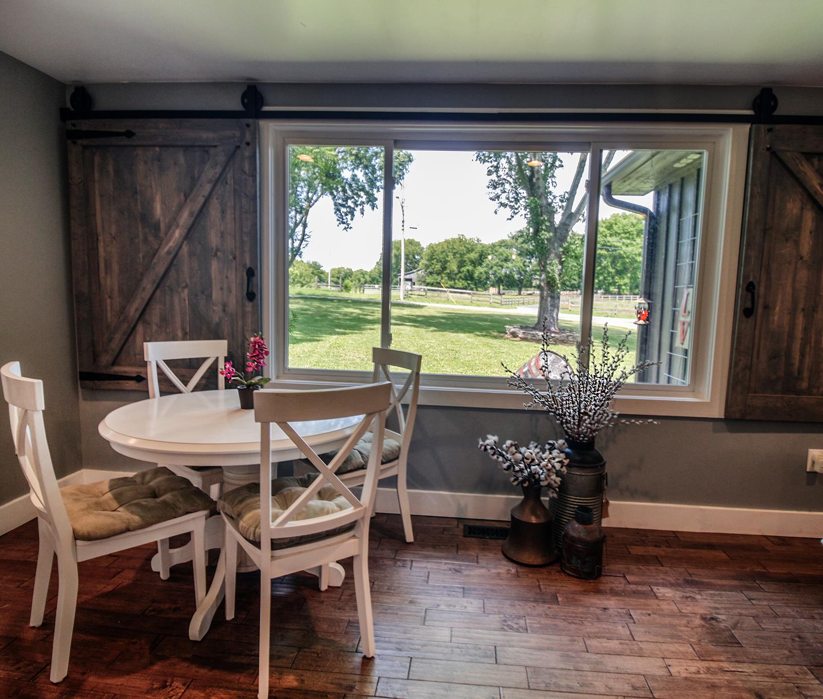 444 Canaan Road Columbia, TN 38401 - Photo 16 of 30 Eat in kitchen with big window with barn doors as window coverings!