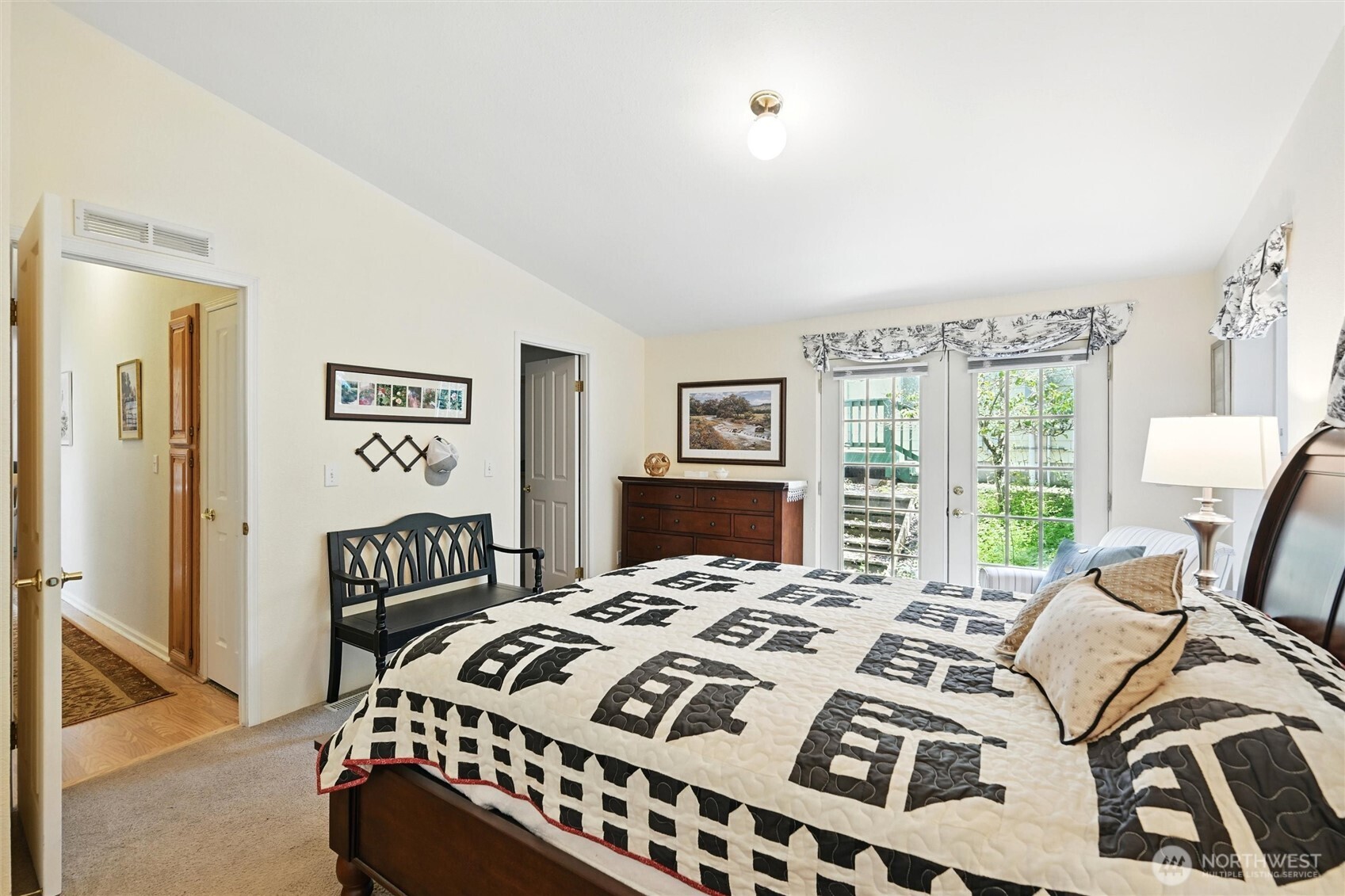 4949 Samish Way, Unit 56 Bellingham, WA 98229 - Photo 11 of 33 a bedroom with a bed next to a window