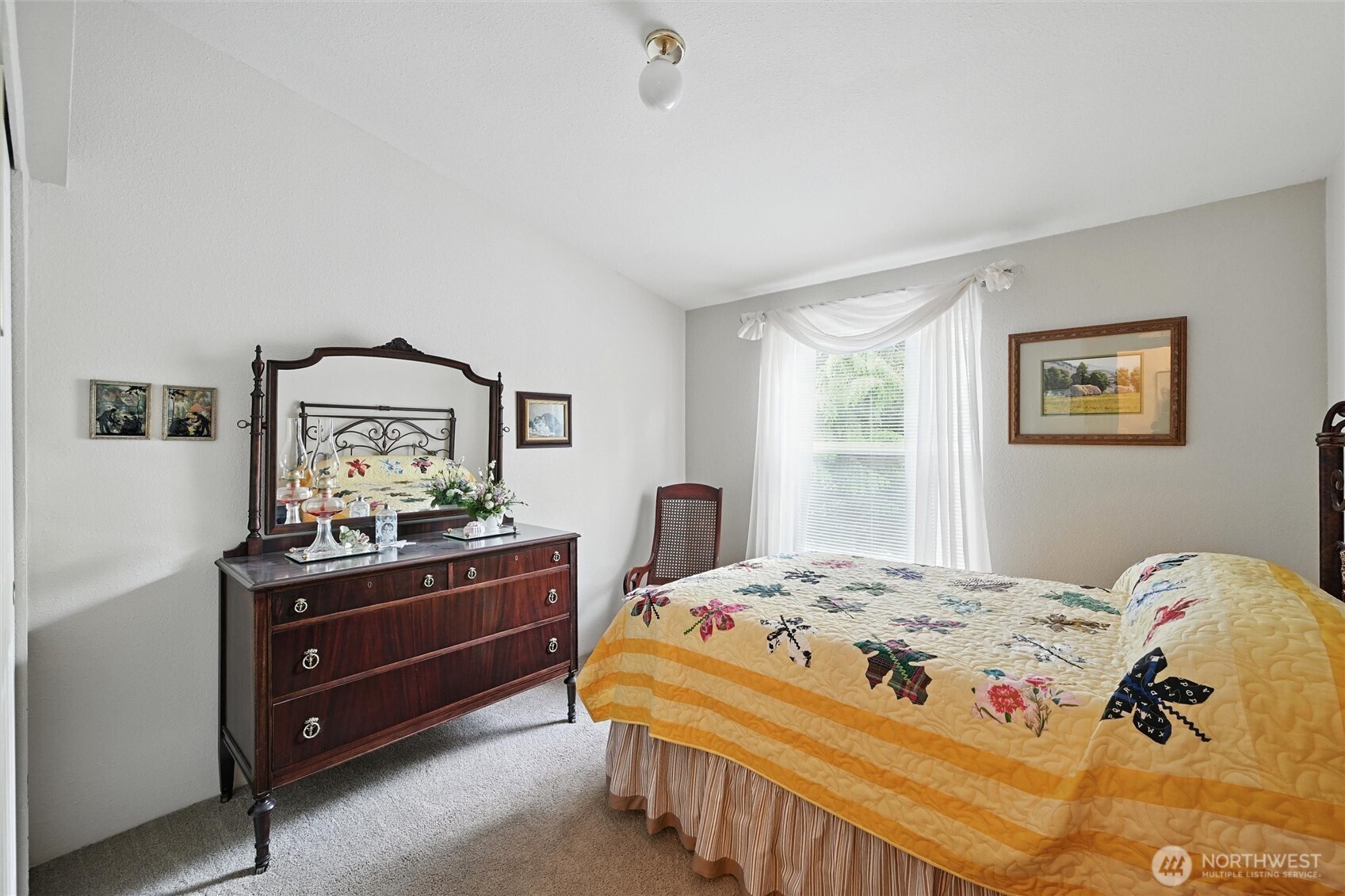 4949 Samish Way, Unit 56 Bellingham, WA 98229 - Photo 14 of 33 a bedroom with a bed and a dresser