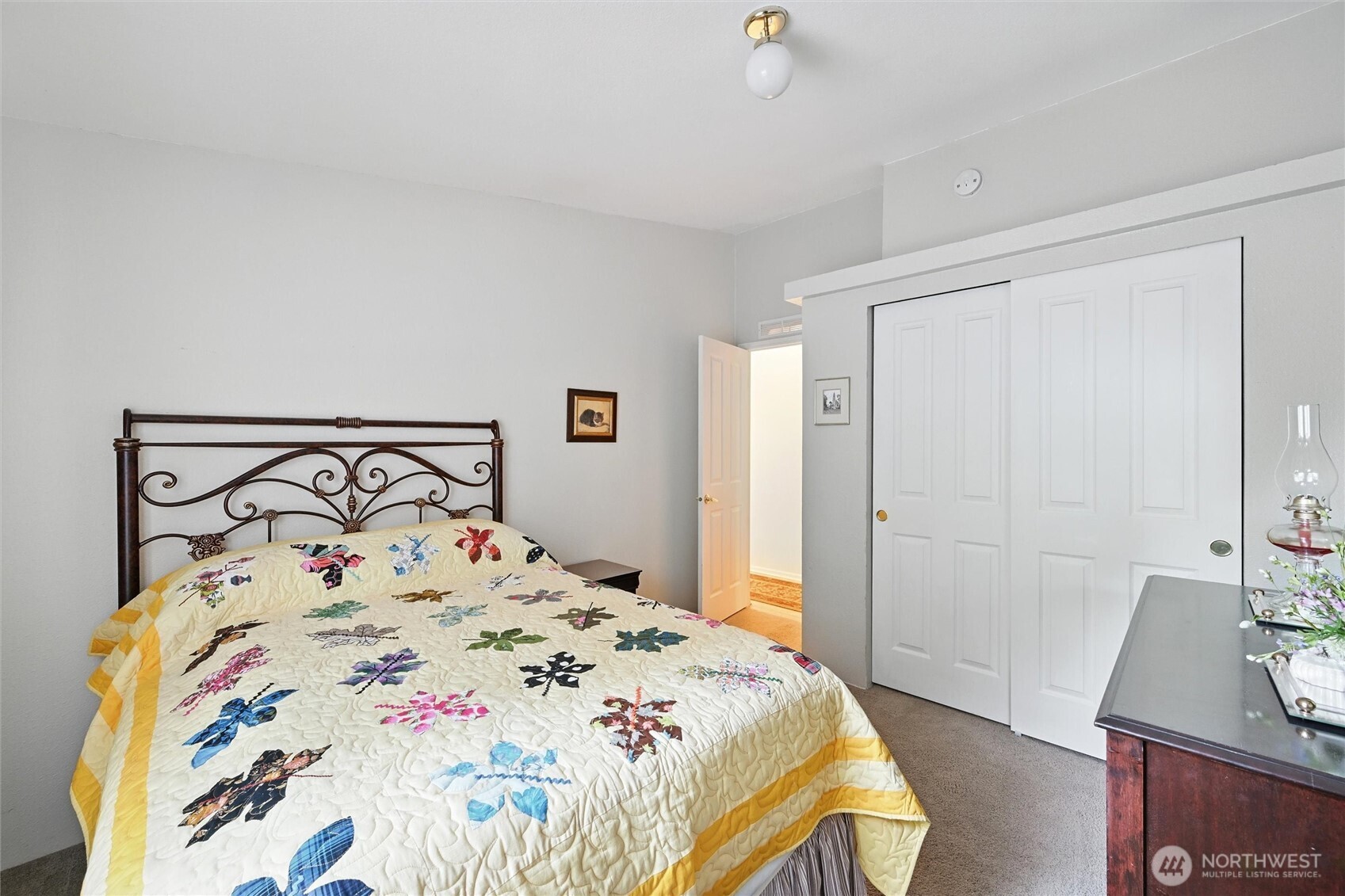 4949 Samish Way, Unit 56 Bellingham, WA 98229 - Photo 15 of 33 a bedroom with a bed and a dresser
