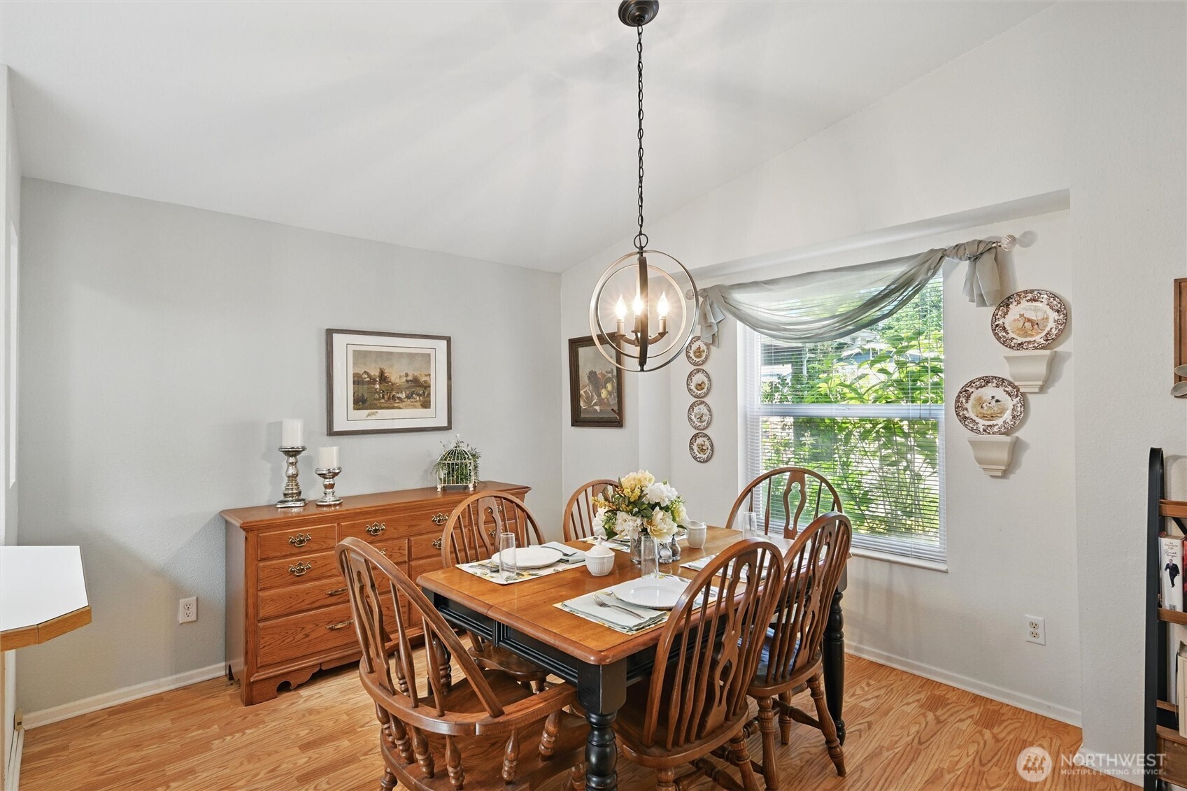 4949 Samish Way, Unit 56 Bellingham, WA 98229 - Photo 20 of 33 a view of a dining room with furniture window and wooden floor