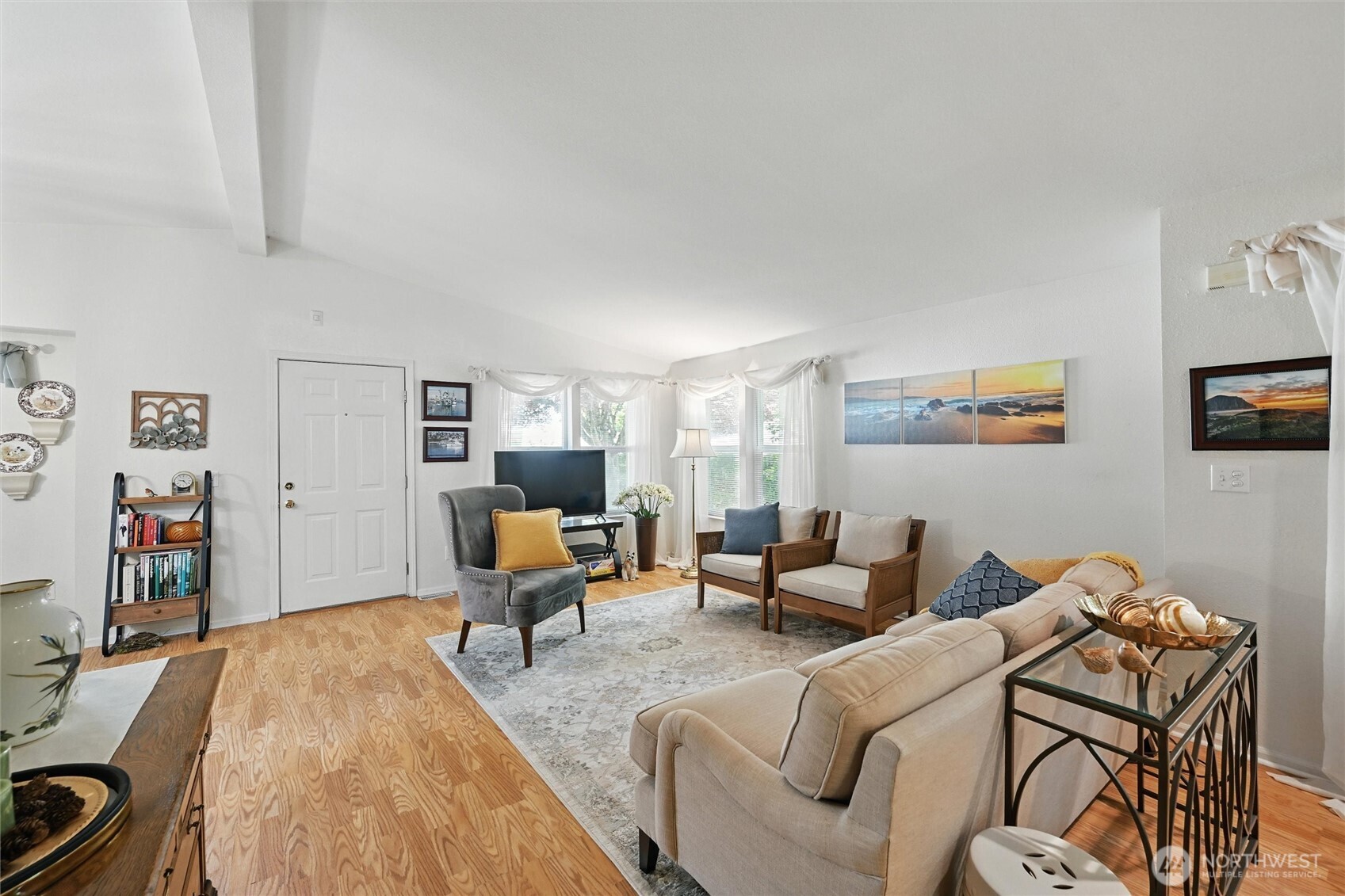 4949 Samish Way, Unit 56 Bellingham, WA 98229 - Photo 25 of 33 a living room with furniture and a flat screen tv