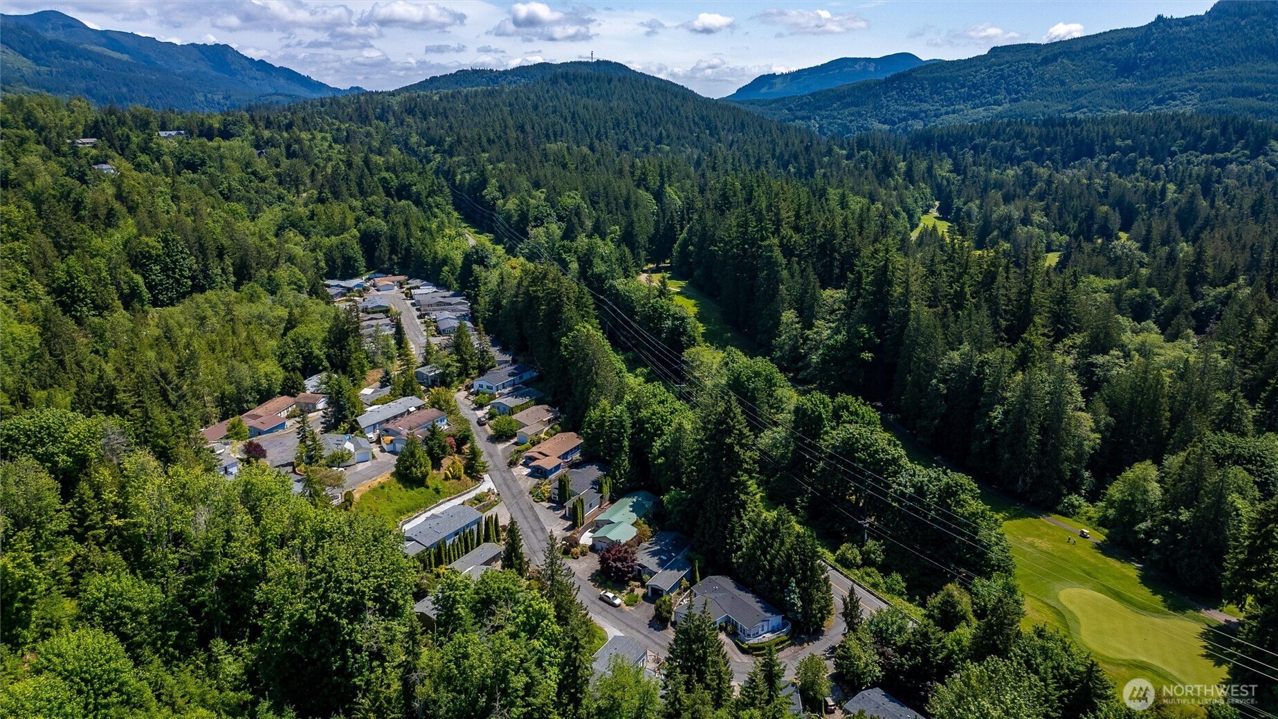 4949 Samish Way, Unit 56 Bellingham, WA 98229 - Photo 30 of 33 an aerial view of a house with mountain view
