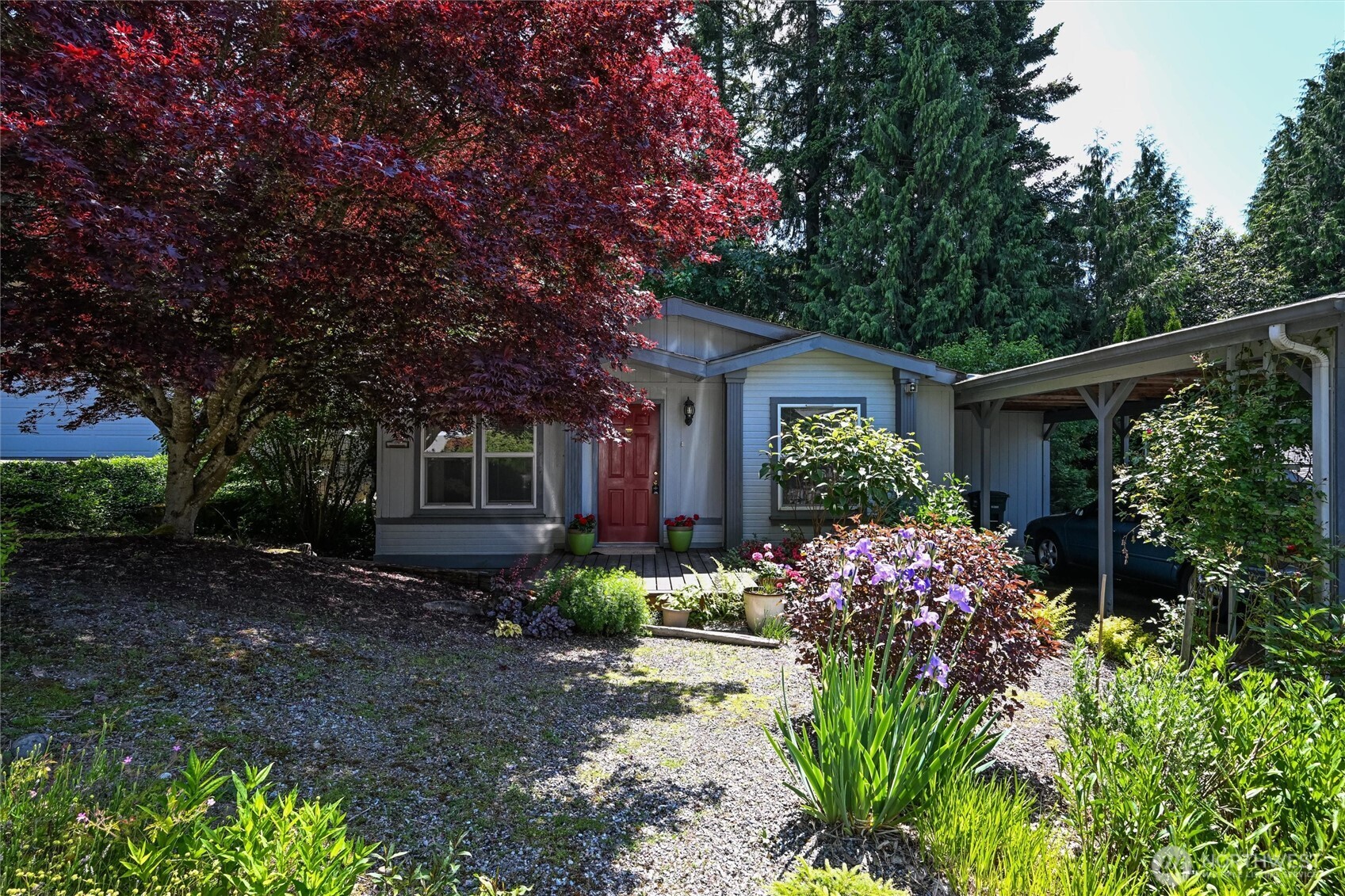 4949 Samish Way, Unit 56 Bellingham, WA 98229 - Photo 6 of 33 a front view of a house with garden