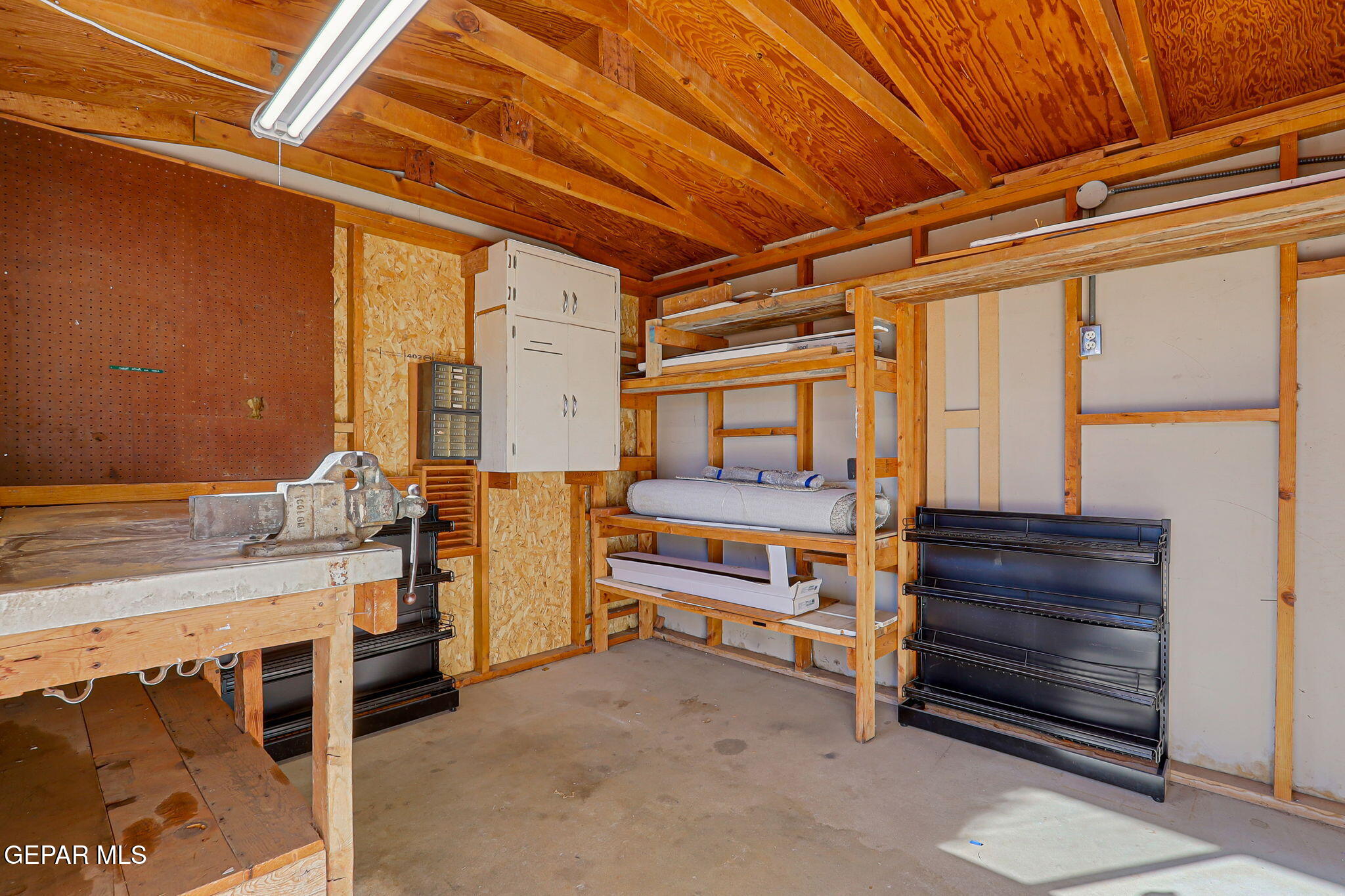 2801 Dunoon Drive El Paso, TX 79925 - Photo 11 of 41 a view of walk in closet with clothes and shoes
