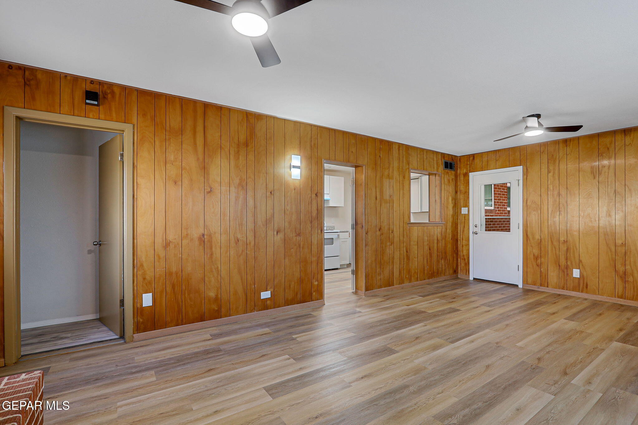 2801 Dunoon Drive El Paso, TX 79925 - Photo 16 of 41 a view of an empty room with wooden floor