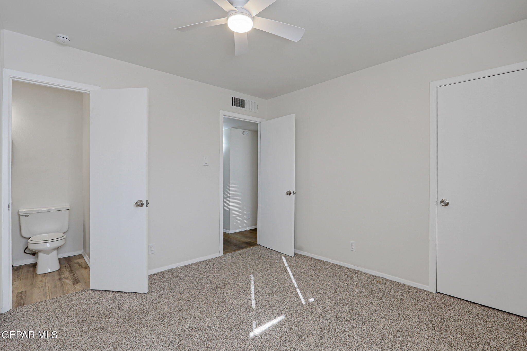 2801 Dunoon Drive El Paso, TX 79925 - Photo 39 of 41 a view of a room with a stylish ceiling fan and entryway