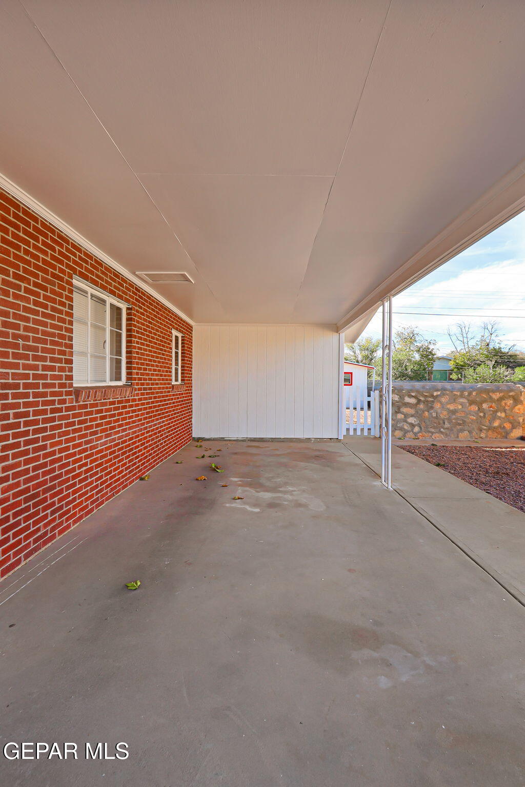 2801 Dunoon Drive El Paso, TX 79925 - Photo 4 of 41 a view of an empty room with wooden floor and fence