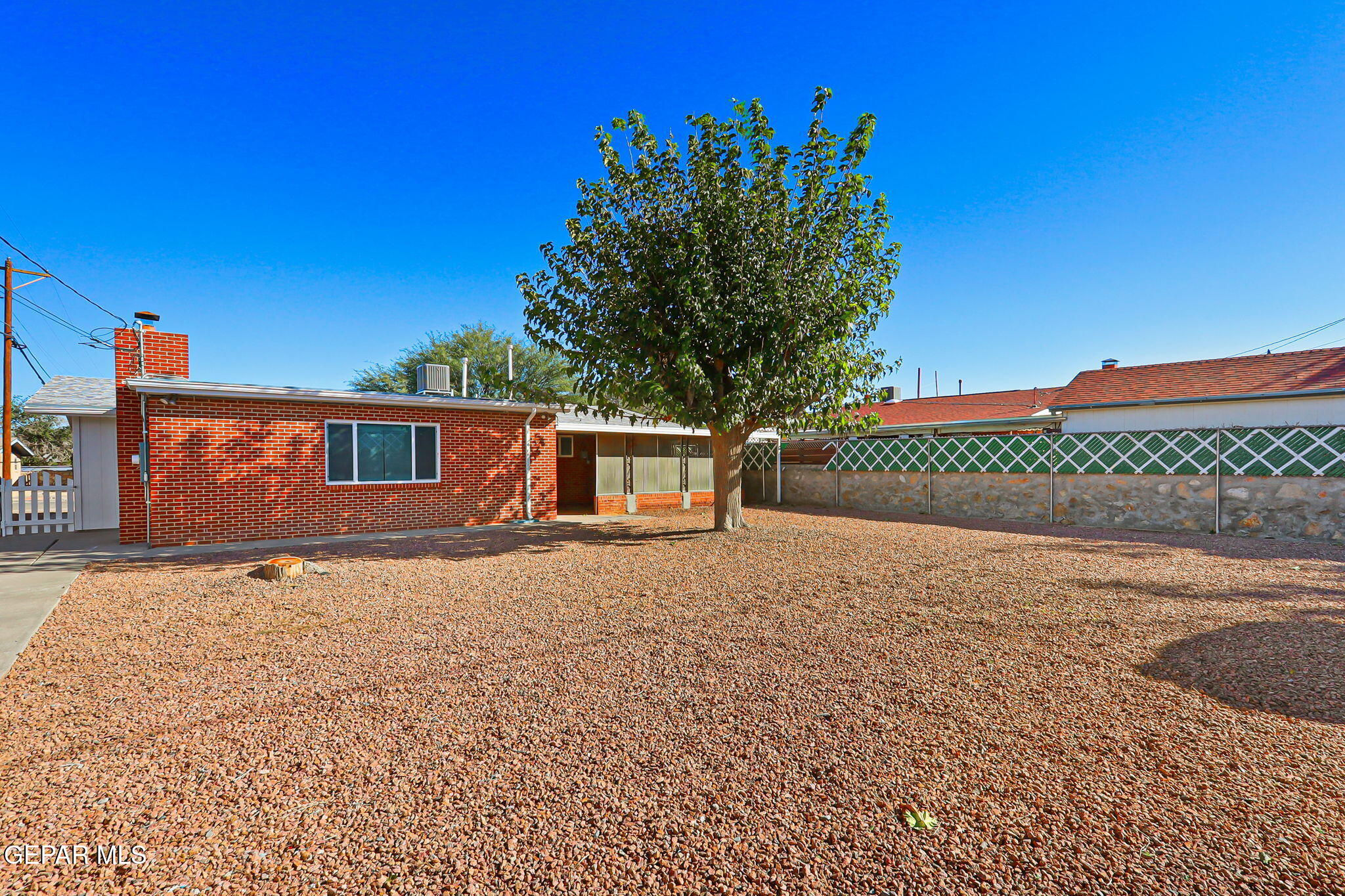 2801 Dunoon Drive El Paso, TX 79925 - Photo 8 of 41 a front view of a house with a yard