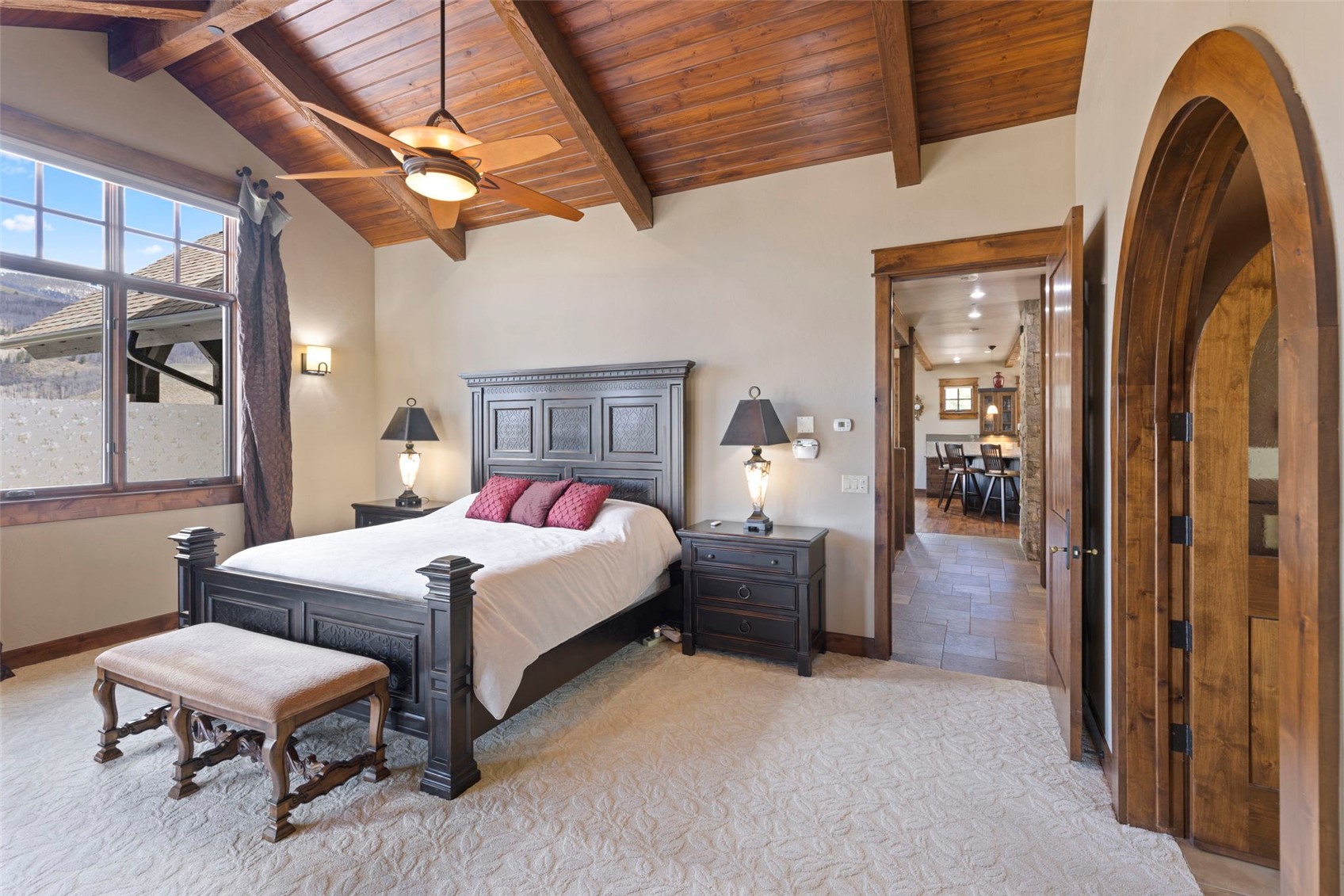 210 Game Trail Road Silverthorne, CO 80498 - Photo 7 of 50 King size bed in this spacious master bedroom with custom wood door to master bath