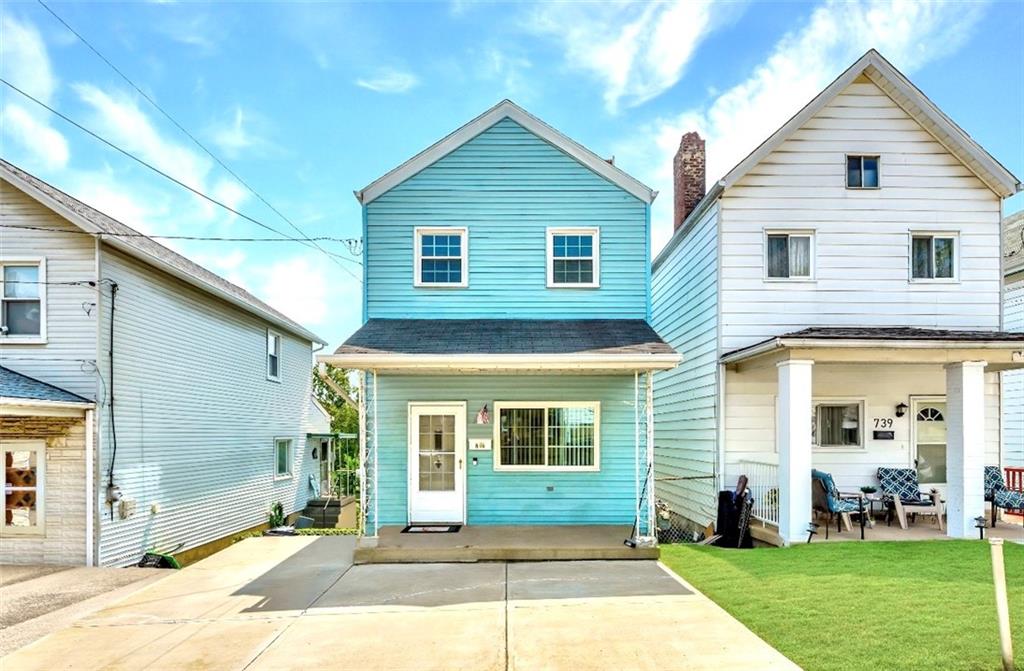 737 Railroad Street McKees Rocks, PA 15136 - Photo 1 of 17 a front view of a house with a yard