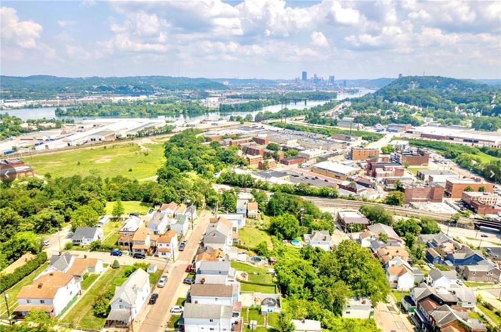 737 Railroad Street McKees Rocks, PA 15136 - Photo 16 of 17 a view of a city with mountains in the background