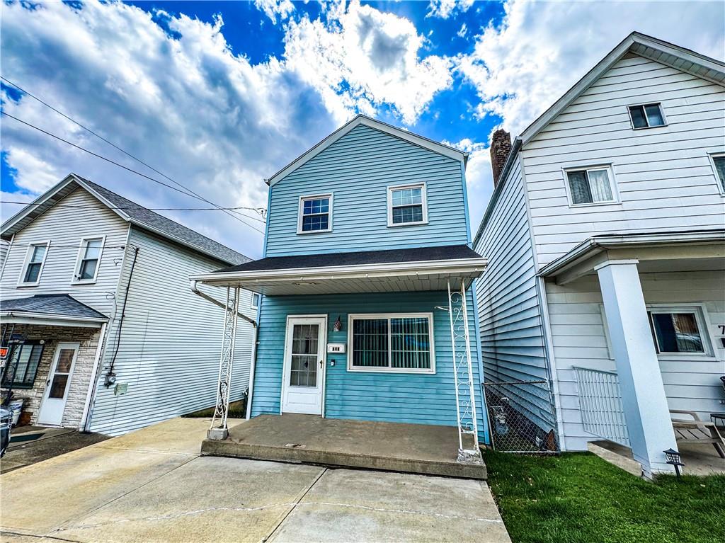 737 Railroad Street McKees Rocks, PA 15136 - Photo 3 of 17 a front view of a house with a garden