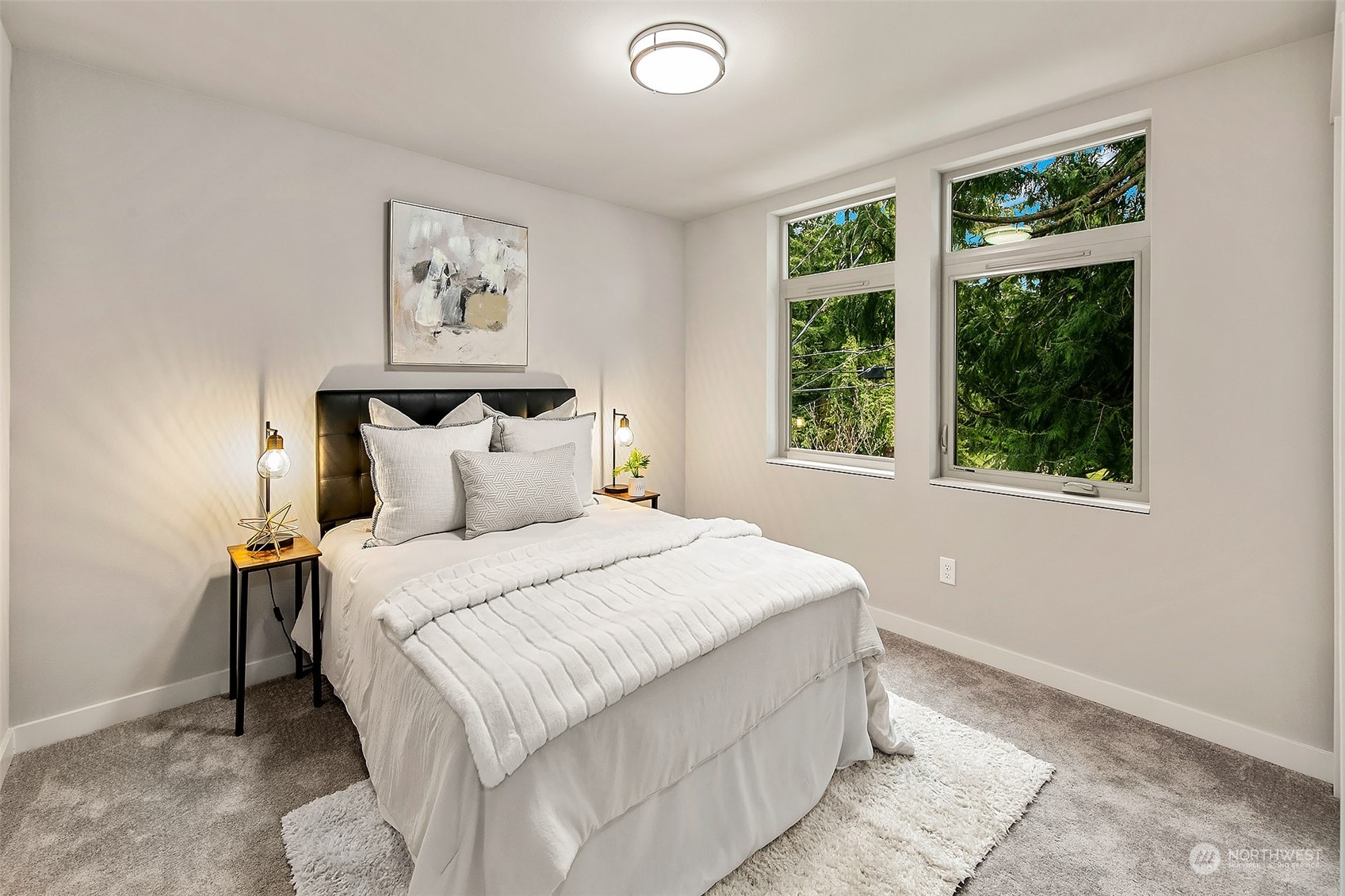 8435 22nd Avenue Southwest Seattle, WA 98106 - Photo 11 of 22 a bedroom with a bed and a window