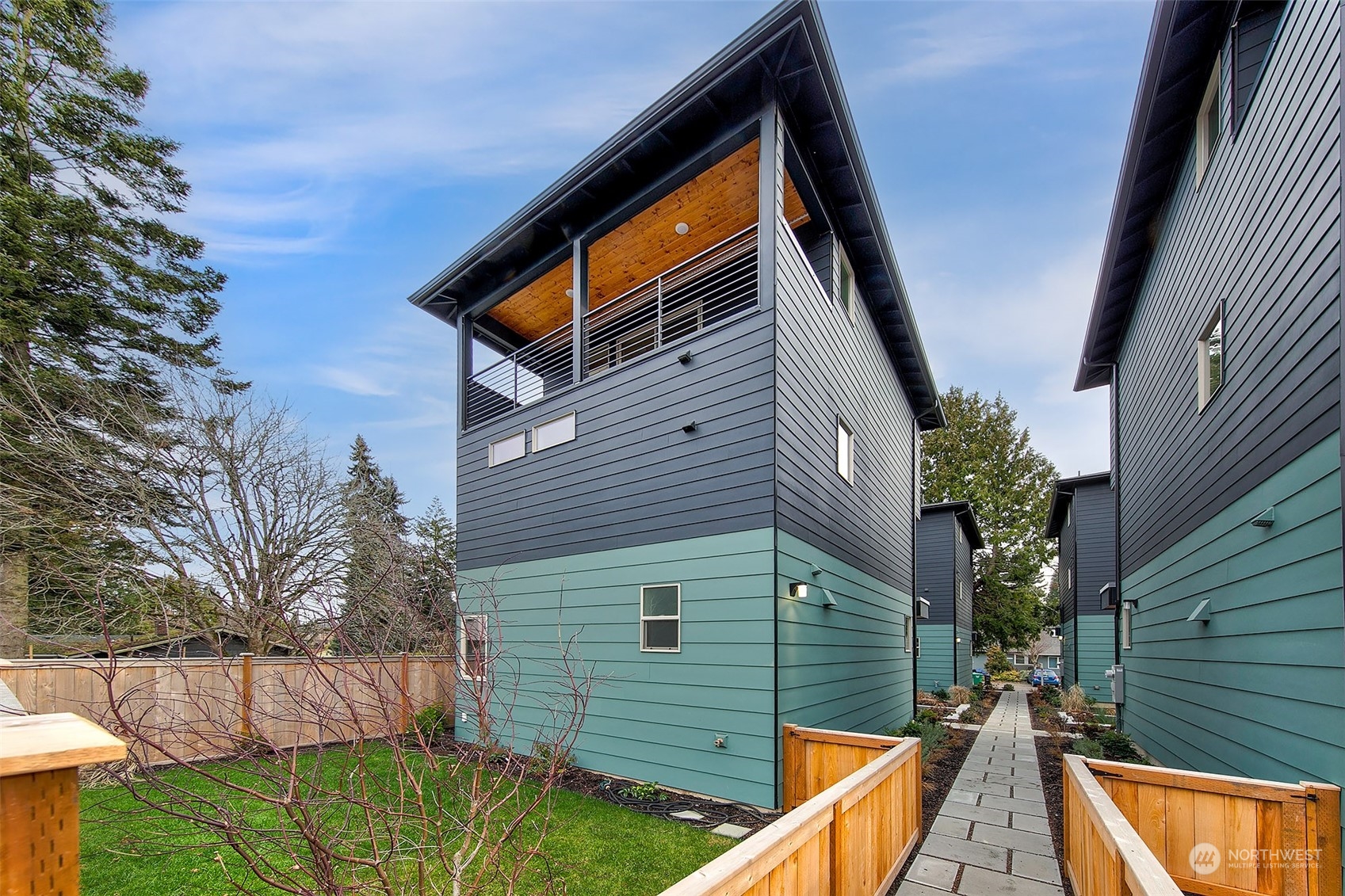8435 22nd Avenue Southwest Seattle, WA 98106 - Photo 19 of 22 a view of a house with a backyard