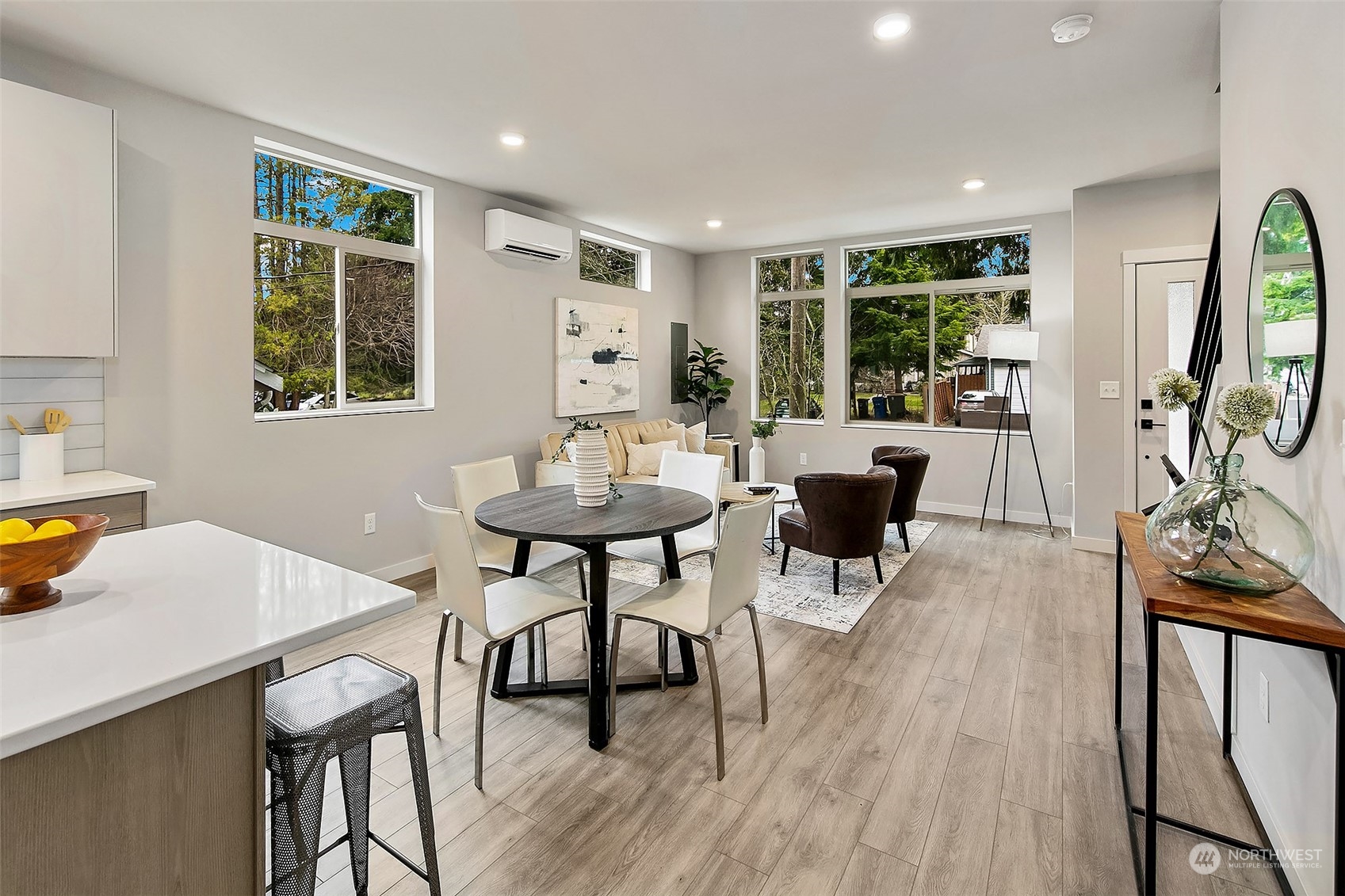 8435 22nd Avenue Southwest Seattle, WA 98106 - Photo 2 of 22 a view of a dining room with furniture window and outside view