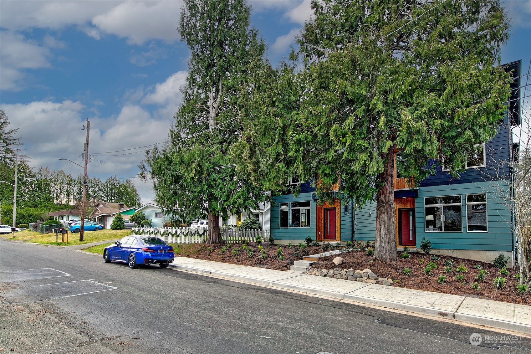 8435 22nd Avenue Southwest Seattle, WA 98106 - Photo 22 of 22 a car parked on the side of a street