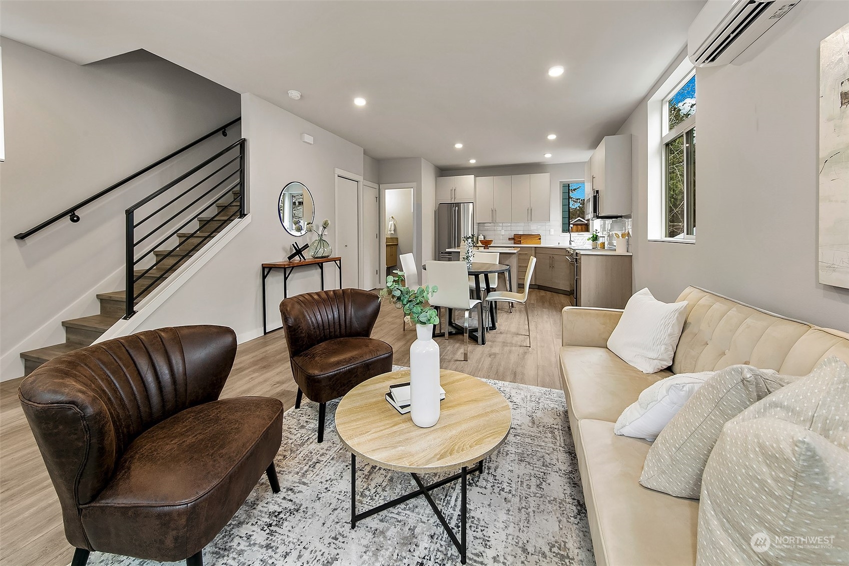 8435 22nd Avenue Southwest Seattle, WA 98106 - Photo 5 of 22 a living room with furniture and a wooden floor