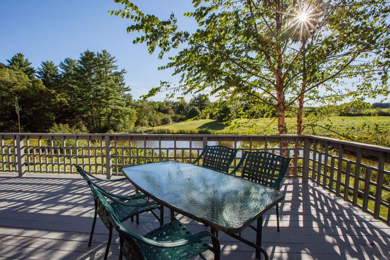 128 Longwoods Road Cumberland Center, ME 04021 - Photo 30 of 35 The expansive deck overlooks fields,...