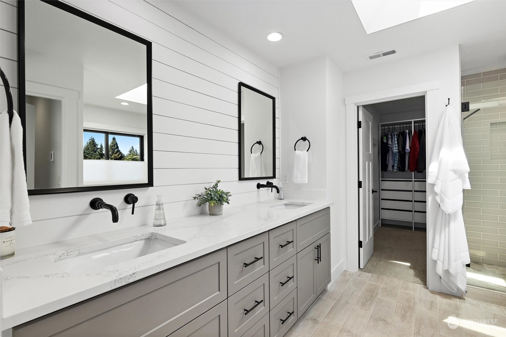 331 8th Avenue Kirkland, WA 98033 - Photo 23 of 40 a bathroom with a double vanity sink and mirror