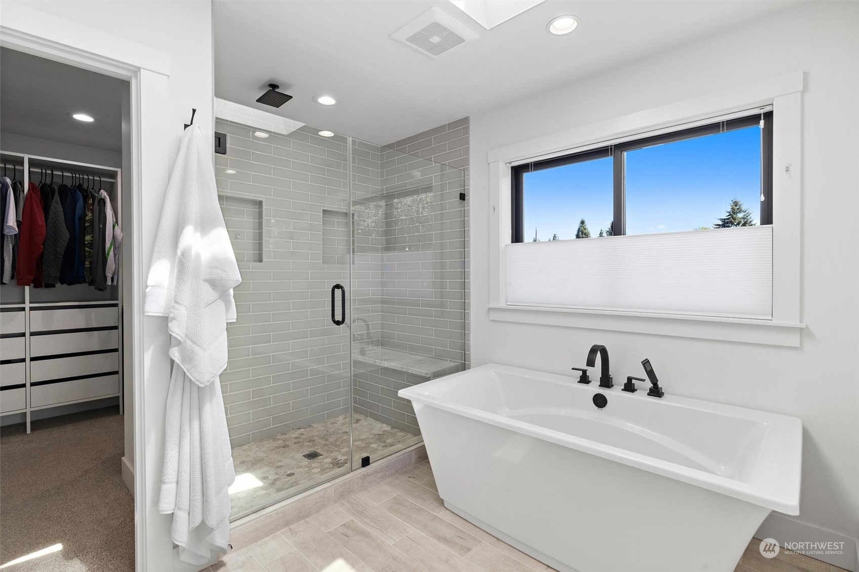 331 8th Avenue Kirkland, WA 98033 - Photo 24 of 40 a bathroom with a bathtub and a shower