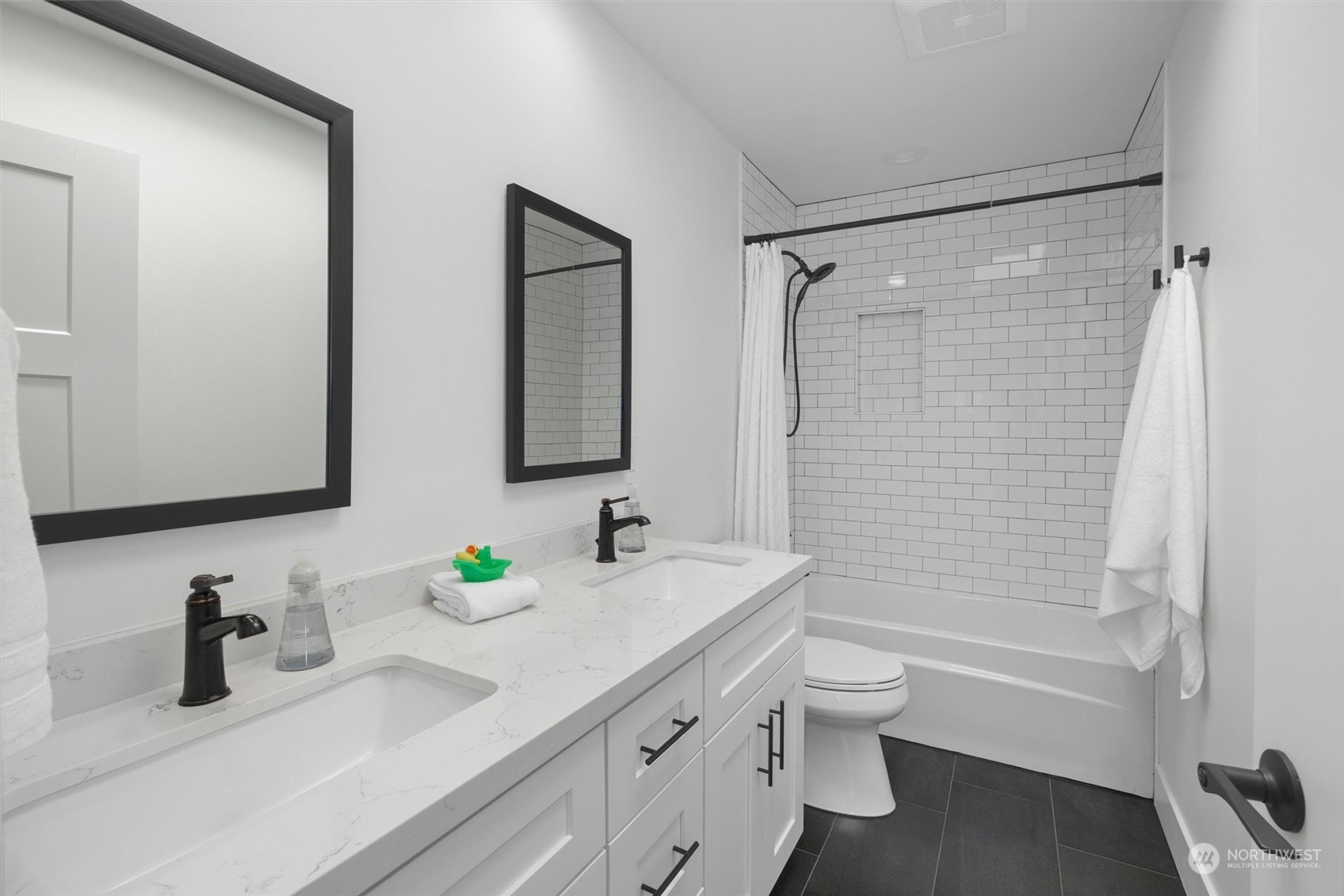 331 8th Avenue Kirkland, WA 98033 - Photo 27 of 40 a bathroom with a granite countertop sink toilet and shower