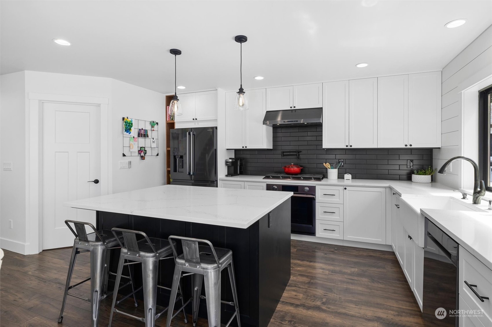 331 8th Avenue Kirkland, WA 98033 - Photo 10 of 40 a kitchen that has a cabinets and a stove