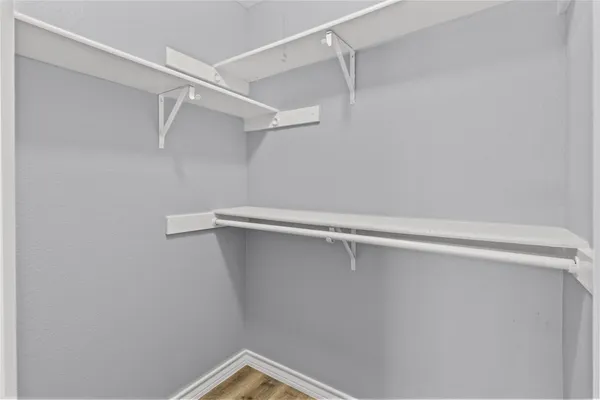a view of a room with racks on the wall