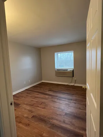 a view of an empty room and window