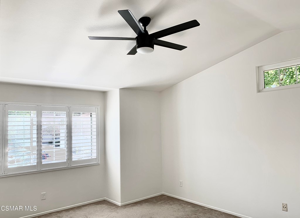 468 Pavarotti Drive Oak Park, CA 91377 - Photo 15 of 17 a view of a livingroom with a ceiling fan & windows
