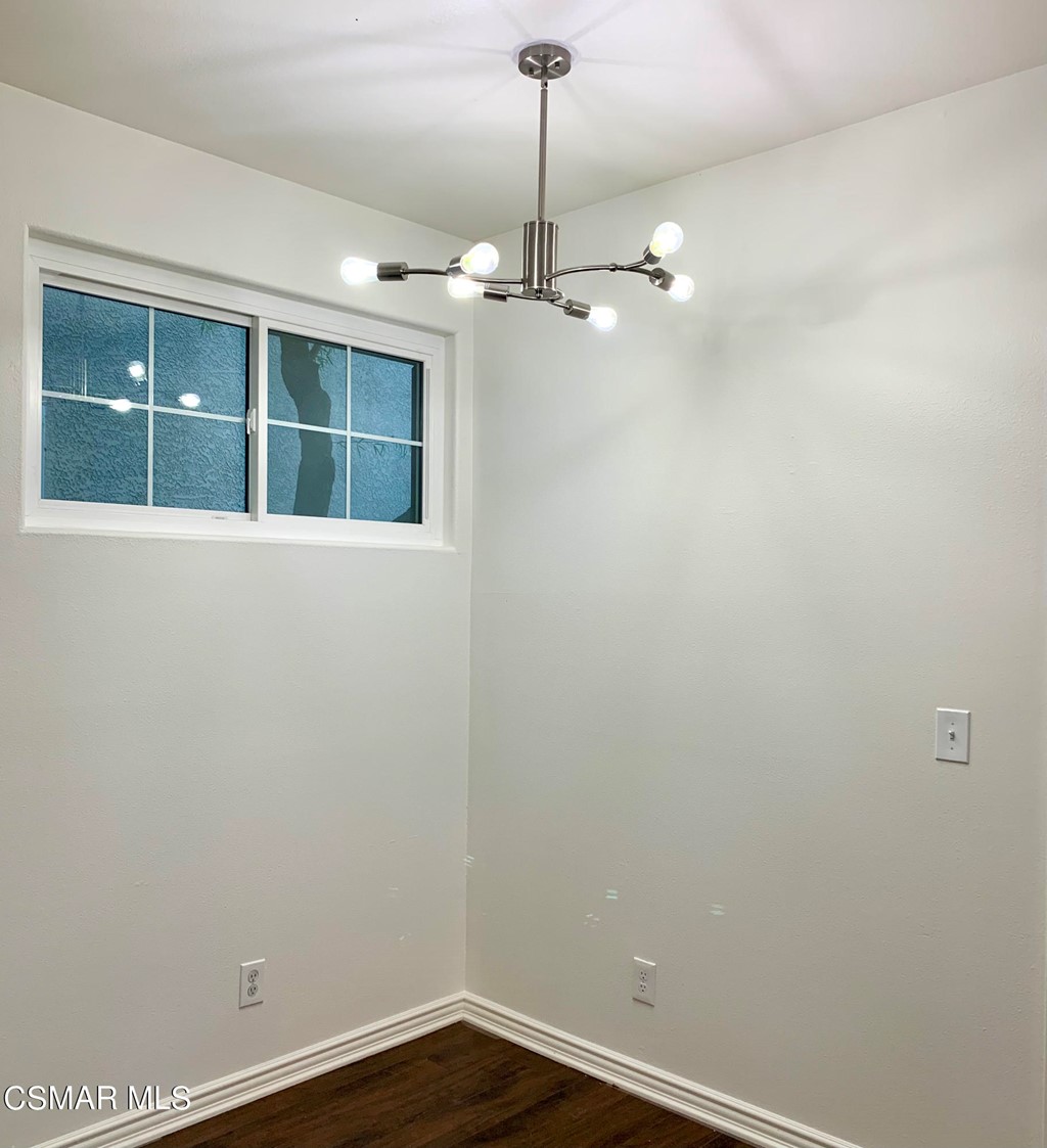468 Pavarotti Drive Oak Park, CA 91377 - Photo 7 of 17 en empty room with a window and ceiling fan