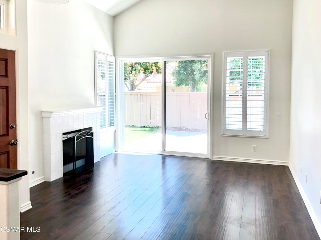 468 Pavarotti Drive Oak Park, CA 91377 - Photo 9 of 17 a view of an empty room with wooden floor and a window