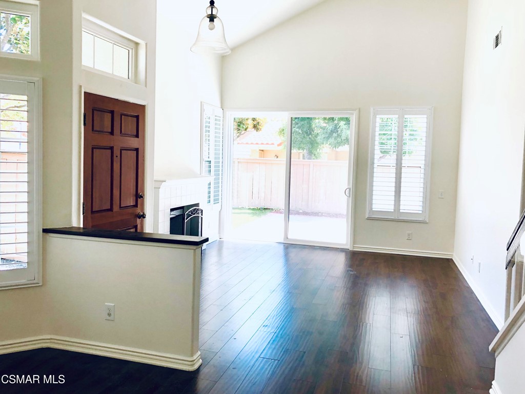 468 Pavarotti Drive Oak Park, CA 91377 - Photo 10 of 17 an empty room with wooden floor and windows