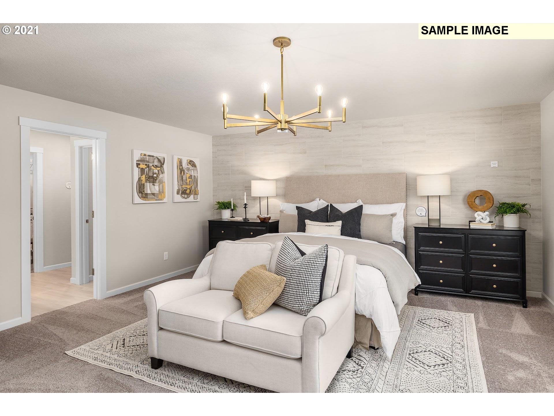 4260 South Laughing Water Circle Ridgefield, WA 98642 - Photo 11 of 24 a living room with furniture and a table