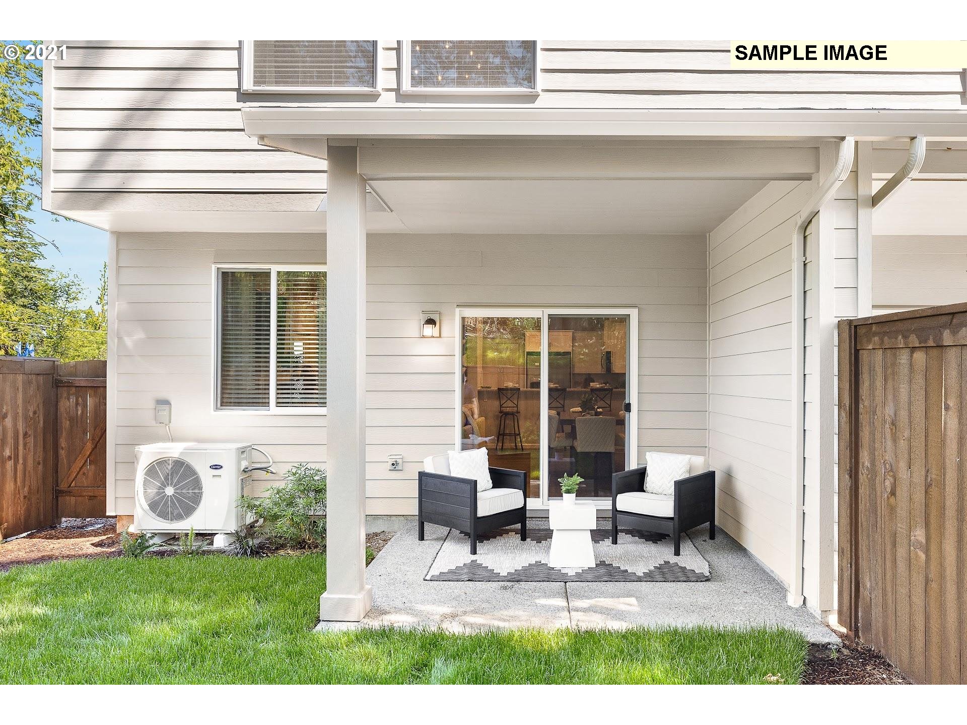 4260 South Laughing Water Circle Ridgefield, WA 98642 - Photo 22 of 24 a view of backyard with a patio and outdoor seating