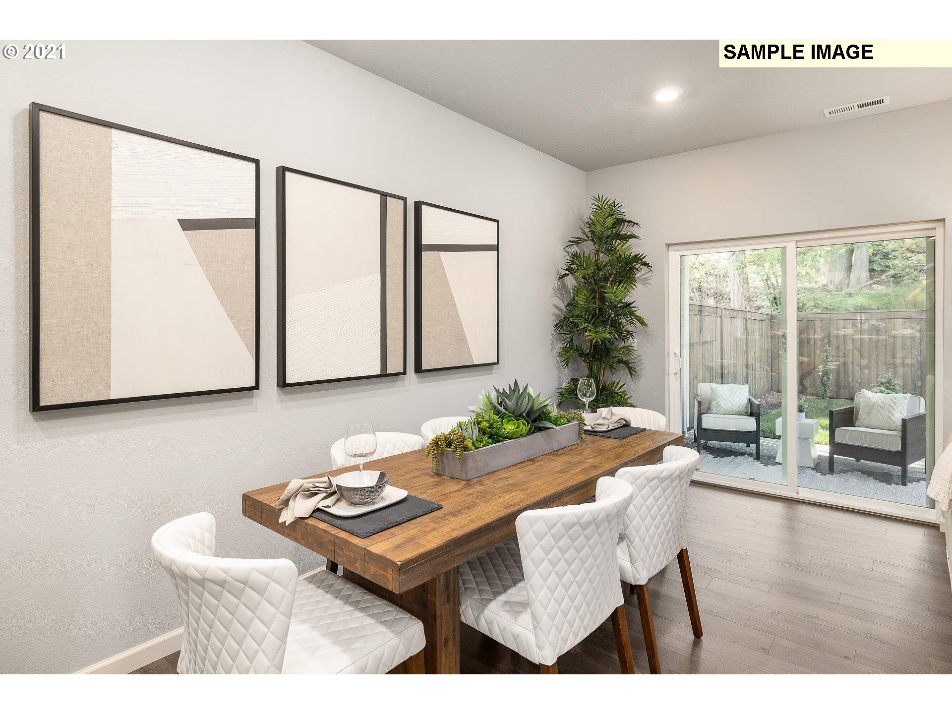 4260 South Laughing Water Circle Ridgefield, WA 98642 - Photo 8 of 24 a living room with furniture and a large window