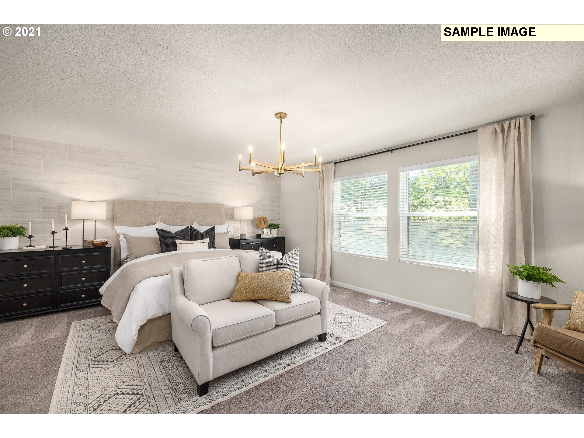 4260 South Laughing Water Circle Ridgefield, WA 98642 - Photo 10 of 24 a living room with furniture and a large window