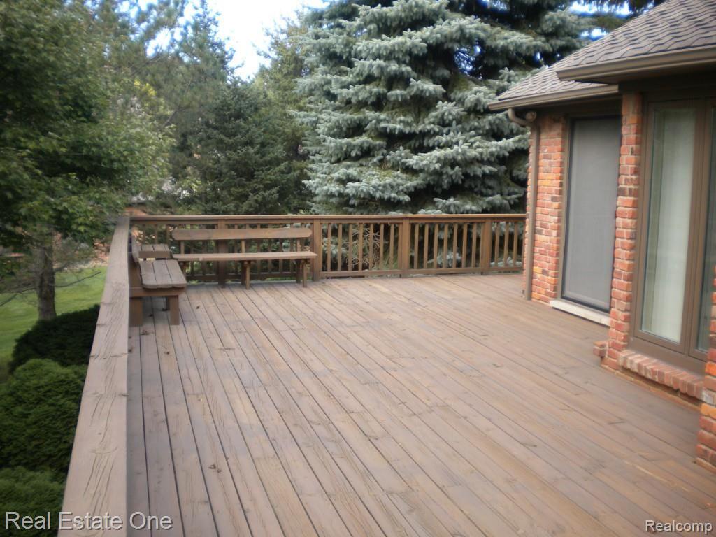 36615 Valley Ridge Drive Farmington, MI 48331 - Photo 13 of 51 Giant deck for entertaining or just relax in the nature surrounding!