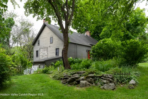 a view of a back yard of the house
