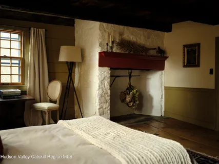 a view of a hallway view with wooden floor and staircase