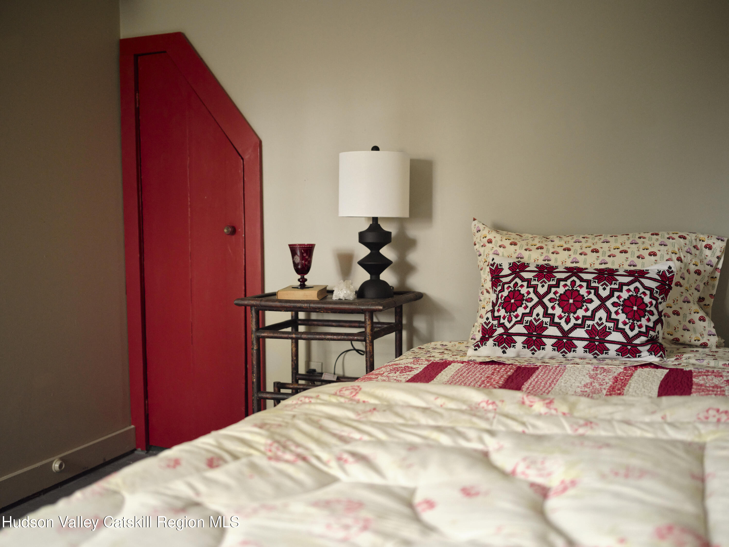 50 Conklin Hill Road Milton, NY 12547 - Photo 21 of 38 a bedroom with a bed and a table