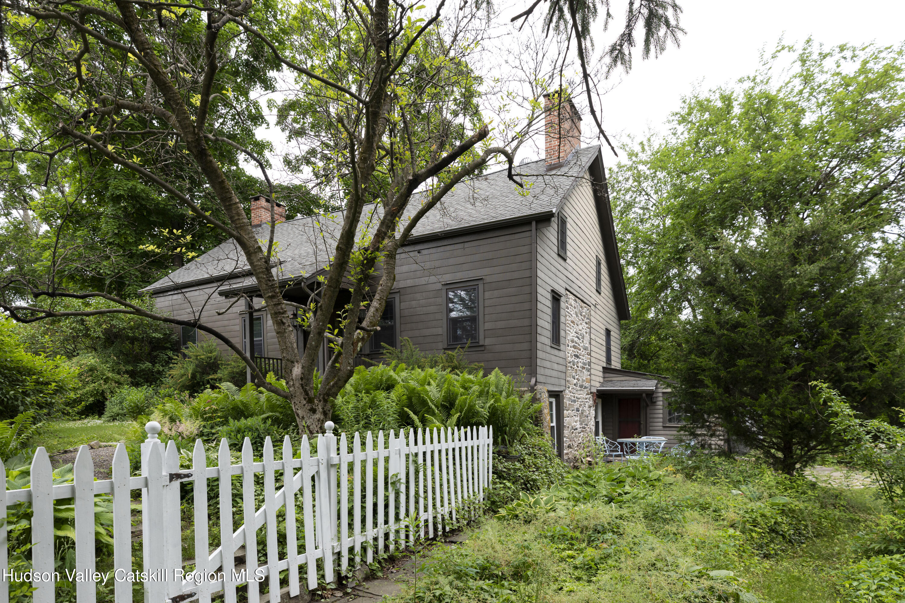 50 Conklin Hill Road Milton, NY 12547 - Photo 32 of 38 a view of a house with a small yard and plants