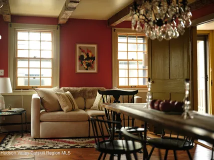 a bathroom with a sink vanity granite and a mirror