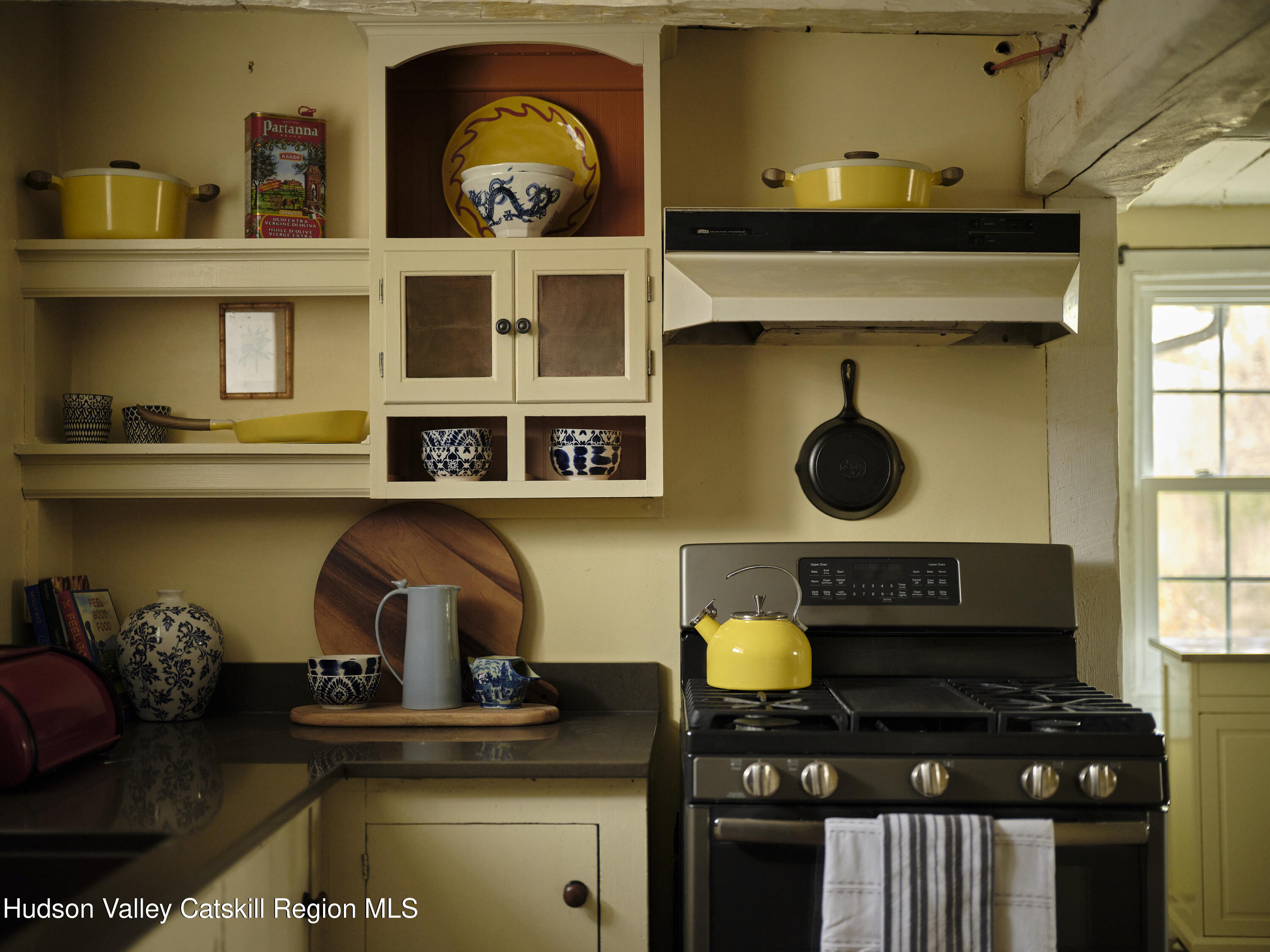 50 Conklin Hill Road Milton, NY 12547 - Photo 7 of 38 a kitchen with a stove and cabinets