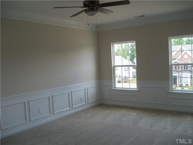 242 Forbes Road, Unit LOT16 Wake Forest, NC 27587 - Photo 10 of 12 Large master bedroom with his and hers walk-in closets, crown and neck molding, chair rail and shadow box moldings too. Elegant!